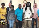 The Town of Gramercy honored and recognized Lutcher High School senior Canera Miles as an Outstanding Leader . Miles (holding plaque) will soon graduate from the St. James Parish Career & Technology Center and will complete the Millwright Training Pro Article Image Alt Text