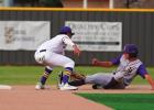 Out by a mile! Second baseman Jaryn Darr tags an Iowa base runner attempting to steal a base. Photo by Tony Schexnayder Bulldogs Go Through Iowa To Get To Sulphur