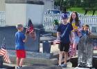 VFW And Local Scouts Place Flags On Vets Graves