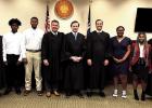 St. James High students who participated in the Judges in the Classroom, Students in the Courtroom program take a picture with the Fifth Circuit Court of Appeal Judges who came to the Convent Courthouse to hold court. Pictured above (from left) are Judge Students See Judicial System In Action Through “Judges In The Classroom, Students In The Courtroom”