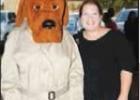 Jackie McCreary from Mosaic poses with McGruff - Mosaic provided refreshments for National Night Out. Article Image Alt Text