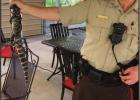 St. James Parish Sheriff’s deputy Mike Dufrene holds a small alligator he caught in the backyard of Paulina resident George St. Pierre. The gator was first located on St. Pierre’s front porch. An Unwelcomed Guest Pays Paulina Man A Visit