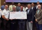 ExxonMobil representative Michael Smith and other company officials presented a $66,000 check to the St. James Parish Council last week representing the cost of hand-held carbon dioxide monitors to be used by the St. James Parish Sheriff's Office. The mon