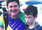 Krewe Of M.A.C. Parade Rolls Through Lutcher And Gramercy On Mardi Gras Day
