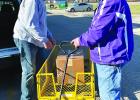 Mr. C.J. Boe and Mr. Emory Forsythe of St. Vincent de Paul in Lutcher prepare for the distribution of items. St. James Retired Teachers Outreach