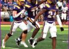 Lutcher Bulldogs Derrick Jackson (#24), Coy Ruiz (#6) and Caden Parquette (#72) celebrate after teammate Colin Roques (#52) recovered a fumble on the third play of last Friday’s game against the St. Charlec Comets. The Bulldogs were beat 16-14 by a 25ya Last Second Field Goal Puts Comets On Top Of Bulldogs