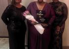 Jillian Graves (center) shows off her Louisiana Early Childhood Teacher of the Year award. Graves is the first St. James Parish Head Start teacher to win the honor.