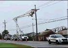Early Sunday morning, after the winds associated with Hurricane Barry subsided to a safe level, Entergy crews were quickly on the scene and restoring electricity throughout St. James Parish. Above, Entergy crews outside the gates of the LSR sugar refinery Article Image Alt Text