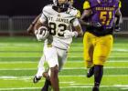 St. James Wildcat sophomore receiver Daylon Smith takes one to the house last Thursday against the L.B. Landry Buccaneers.å Photo by Oliver Hooker St. James Wildcat sophomore receiver Daylon Smith takes one to the house last Thursday against the L.B. Landry Buccaneers.å Photo by Oliver Hooker