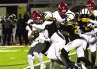 The St. James Wildcats defense gang tackles a Pine ball carrier. The St. James Wildcats defense forced four turnovers during last week’s quarterfinal round win over Pine. The St. James Wildcats defense gang tackles a Pine ball carrier. The St. James Wildcats defense forced four turnovers during last week’s quarterfinal round win over Pine.