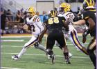 Lutcher Bulldog quarterback Kolby Bourgeois (#17) did not step foot on a football field until his sophomore season, and after starting his junior and senior seasons, Bourgeois will go down as one of the best, most consistent quarterbacks in Bulldog histor Article Image Alt Text