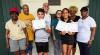 Pictured above holding certificates are Cypress Grove Montessori Academy student Devin Jenkins, who won 1st Place in the 2026 Tour of Restaurants T-Shirt design contest, and Gramercy Elementary student Paisley Aubert, who won 4th Place. The students were 
