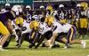 The Lutcher Bulldog defensive line digs in while awaiting the snap. Photo by Michelle Clement, LHS
